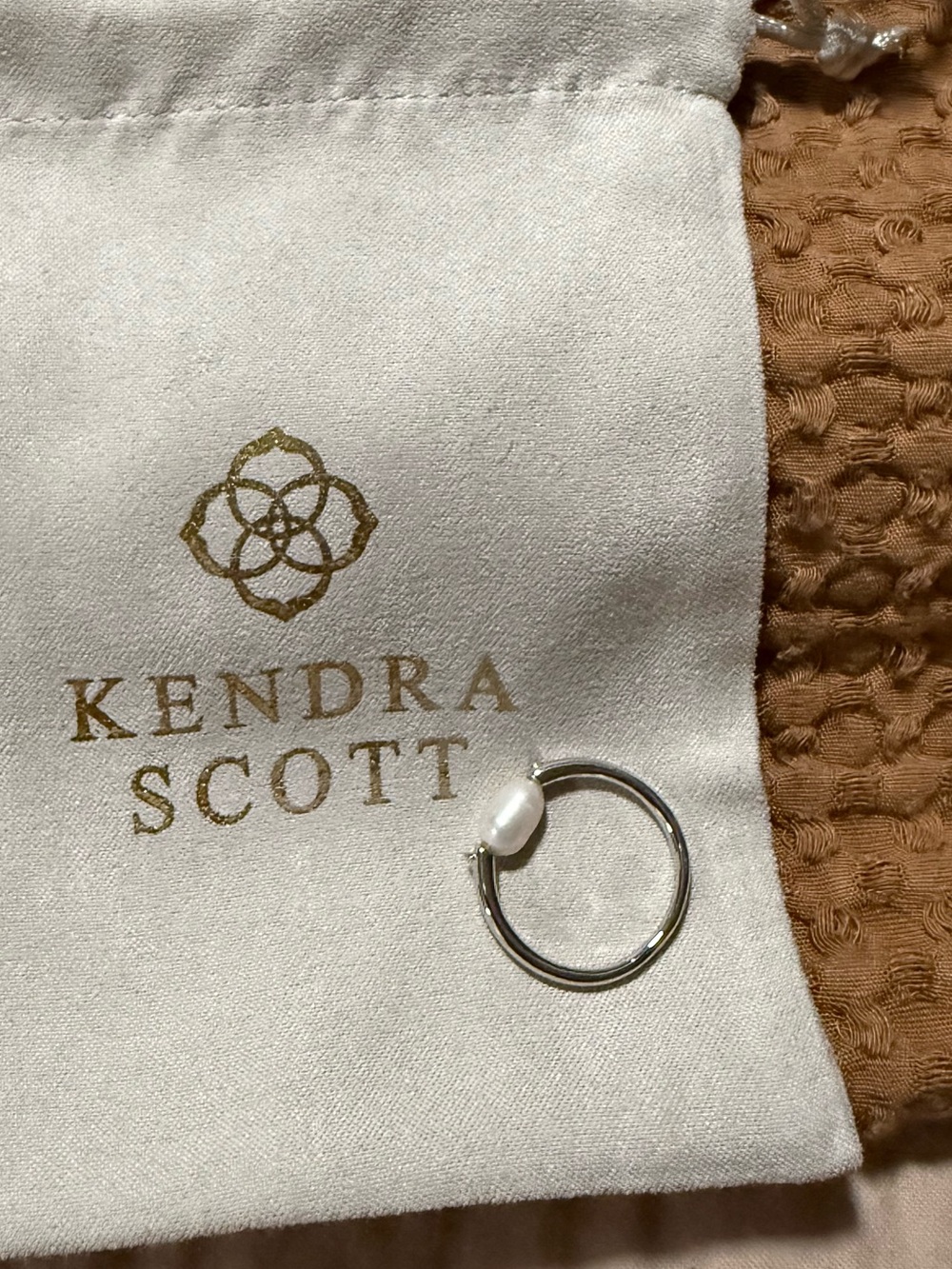 Kendra Scott pouch with ring